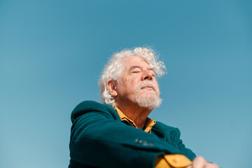 Introspective senior man peaceful portrait