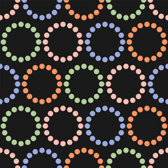 Black seamless pattern with colorful rings