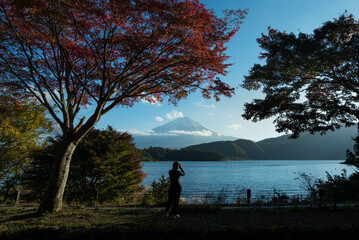 silhouette of a person on a lake