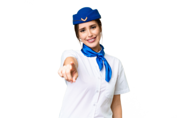 Airplane stewardess over isolated chroma key background points finger at you with a confident expression