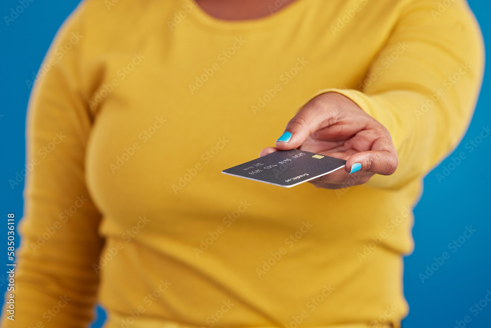 Sticker Credit card, payment and woman hand in a studio ready for finance expenses and sales. Isolated, blue background and paying with a female model showing financial banking method for ecommerce sale