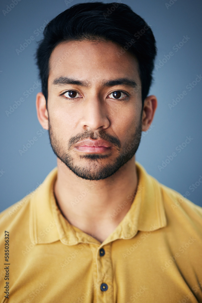 Poster focus, serious and portrait of a male in studio with moody, sadness or mental health problem. tired,
