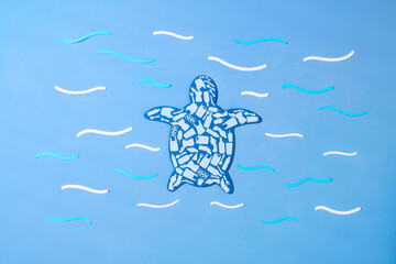 Turtle marine reptile outline filled with plastic trash flat icons