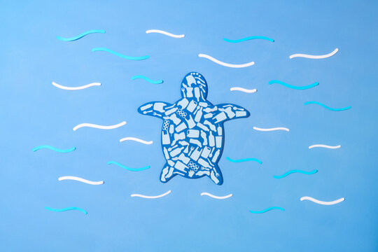 Turtle marine reptile outline filled with plastic trash flat icons