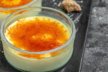 creme brulee, traditional french vanilla cream dessert with caramelised sugar, Restaurant menu, dieting, cookbook recipe top view