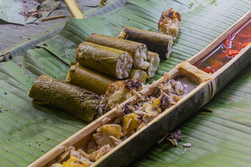 Meal served in bamboo in the forest of Nam Ha National Protected Area, Laos