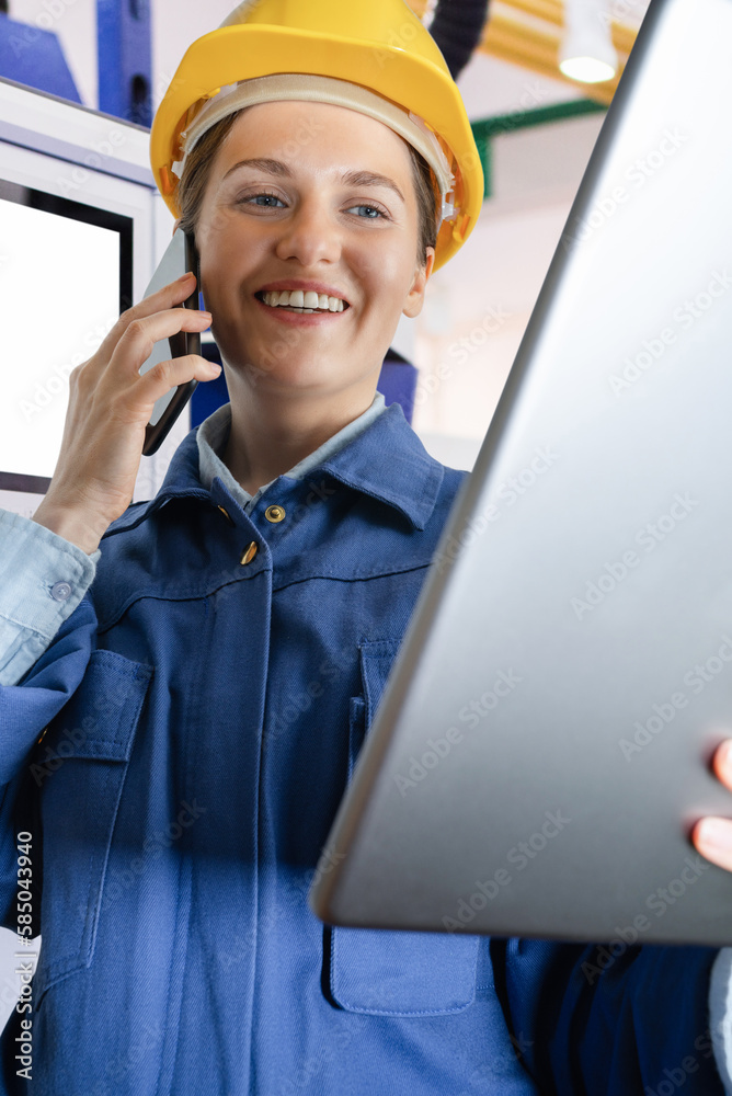 Poster woman engineer with digital tablet and phone on a smart factory. close up