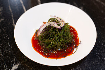 Seasoned with Sea String Sauce. Pressed beautiful red rhodophyta seaweed