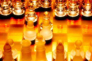 chess pieces and chessboard in glass