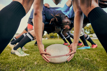 Sport, rugby ball and team on field, men playing game with energy and fitness with huddle together....