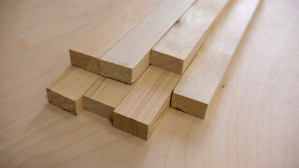 Wooden building blocks on a table in a carpentry workshop