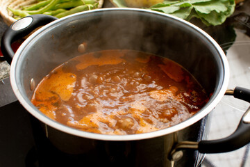 Steamy Hot Soup Boiling in a Close-Up Pan