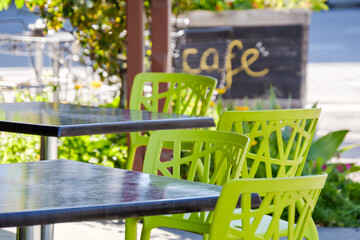Colourful outdoor cafe seating tables and chairs in Adelaide city centre, South Australia