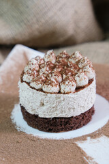 Portioned tiramisu cake. Airy creamy curd biscuit sweetness.
Dessert without sugar, low-calorie. Craft pastry shop, baking recipe