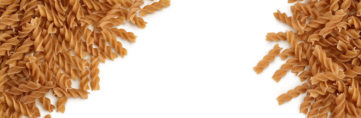 Wolegrain fusilli pasta from durum wheat isolated on white background with  full depth of field. Top view. Flat lay.