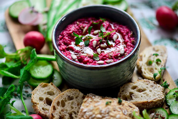 Beetroot dip with fresh vegetables. top view .