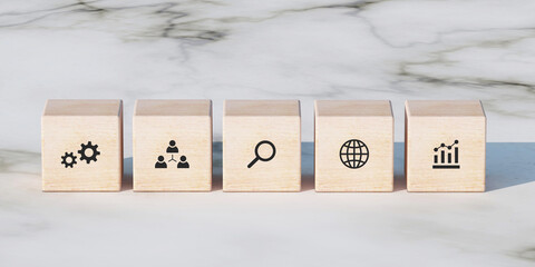 Conceptual business illustration with wooden blocks and icons on marble background