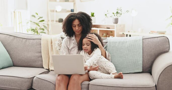 Relax, laptop and mother with daughter on sofa for steaming, cartoon and movies. Bonding, affectionate and weekend with woman and girl in living room at home for search, website and internet