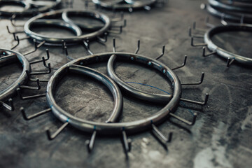 Pieces of steel lined up on the table ready for the welding process