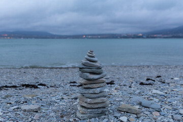 Fototapeta premium Stone sculpture on the Black Sea coast. Gelendzhik. Russia. 20.02.2022