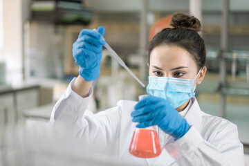 Female scientist working in the laboratory.