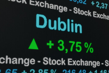 Fototapeta na wymiar Dunlin stock exchange moving up. Ireland, Dublin positive stock market data on a trading screen. Green percentage sign and ticker information. Stock exchange and business concept. 3D illustration