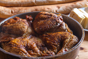 Hot Fried Chicken tobacco in a pan close-up