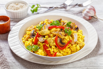 Chicken Paella with mushrooms, red pepper, spices