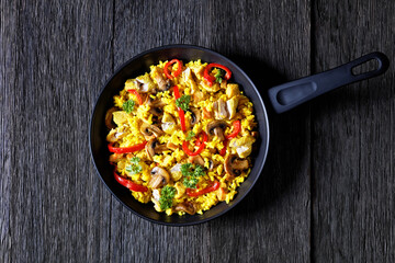 Chicken Paella with mushrooms, red pepper, spices