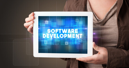 Person holding tablet, technology concept