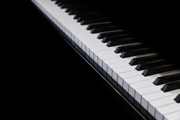 Piano and Piano keyboard with black background.