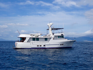 Obraz na płótnie Canvas Motor yacht. Cruise ship. Safari Dive Boat. Luxury white motor yacht on the high seas. 