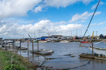Boats, jetties and piers on the River Blyth in Walberswick on the Suffolk coast
