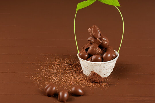 Chocolate day 2023 with beautiful basket and green bow with chocolates and candies inside