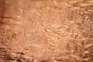 Extreme closeup of crumpled brass foil texture