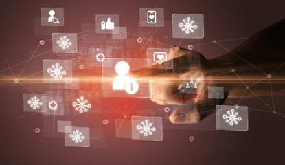 Hand pressing social media multimedia application screen with media icons on futuristic concept