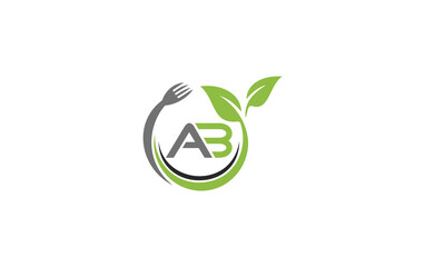 Green leaf nature with spoon and healthy logo design spoon fork and leaf