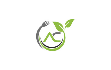 Green leaf nature with spoon and healthy logo design spoon fork and leaf
