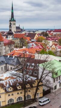 4k Timlapse of aerial view of Tallinn Medieval Old Town in day with cloudy sky, Estonia. Vertical video