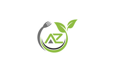 Green leaf nature with spoon and healthy logo design spoon fork and leaf