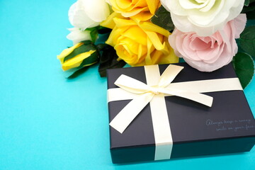 Father's Day yellow roses and gifts (blue background)