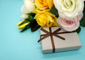 Father's Day yellow roses and gifts (blue background)