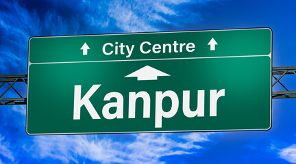 Road sign indicating direction to the city of Kanpur