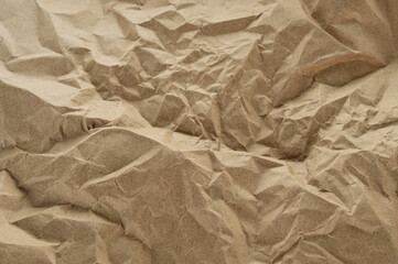 Crumpled craft paper surface as background