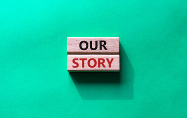Our story symbol. Wooden blocks with words Our story Beautiful green background. Business and Our story concept. Copy space.