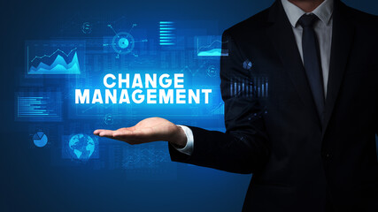 Hand of Businessman holding motivational message