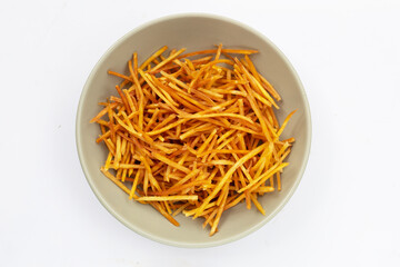 Sweet potato sticks on white background.