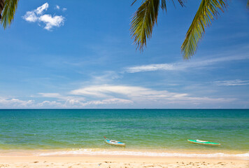 Sand beach with canoes in Phu Quoc close to Duong Dong, Vietnam
