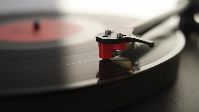 Turntable playing vinyl LP record closeup, Party, leisure, music, hobby, enjoying life, technology concept