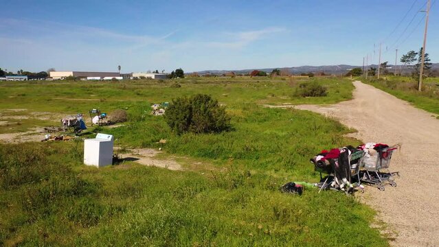 2023 - Excellent aerial footage of abandoned belongings on a field in Lompoc, California.